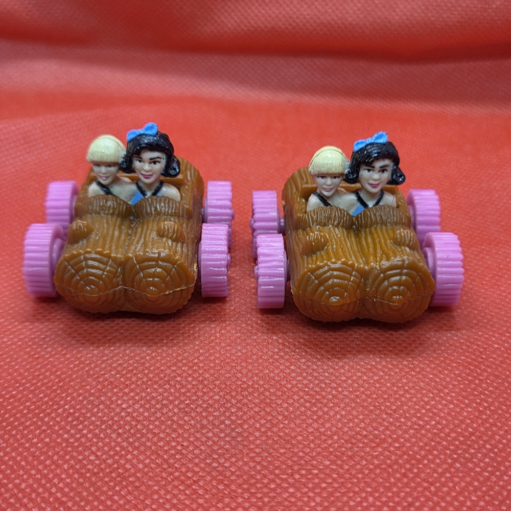 Whimsical Brown and Purple Toy Racers